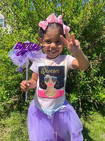 Indya joined the competition — help win amazing prizes! baby_toddler_clothing, botany, clothing, event, fun, grass, happy, joy, leisure, magenta, people_in_nature, person, pink, plant, purple, recreation, smile, t_shirt, toddler, tree