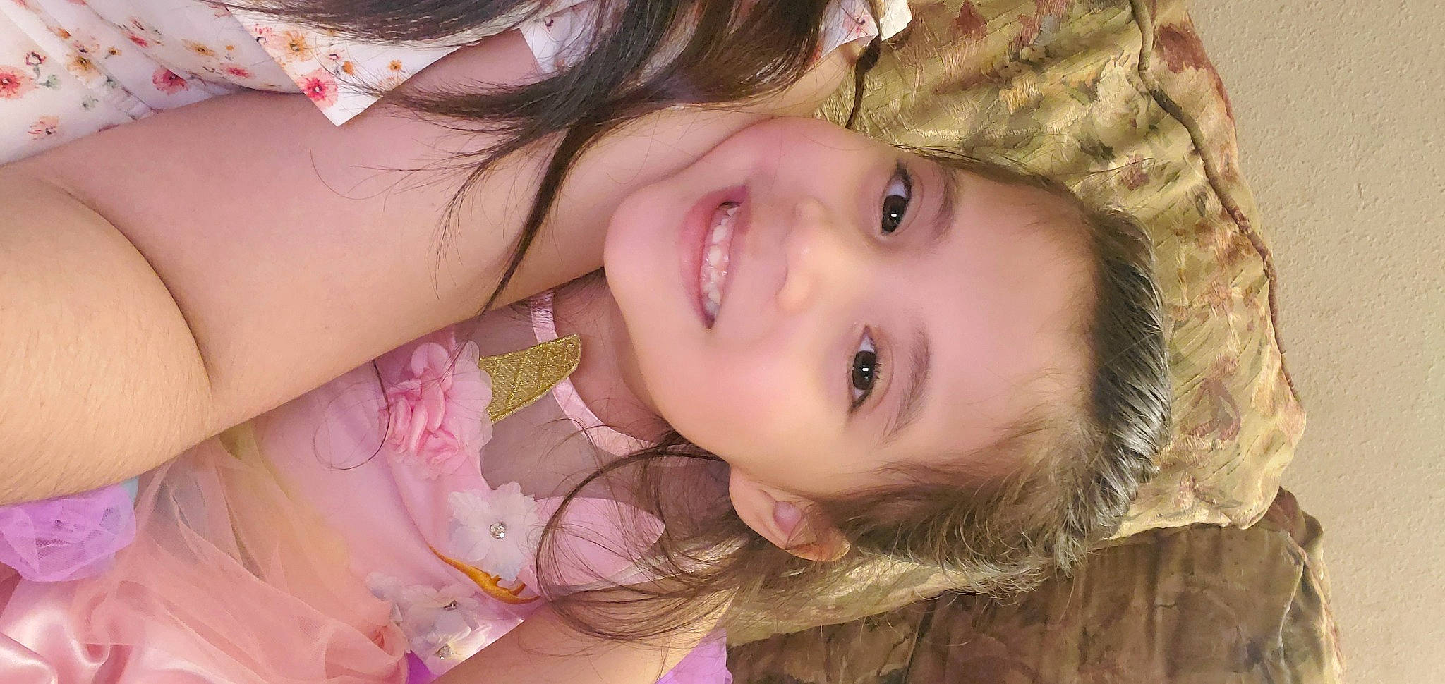 Lulu is registered to the contest to win money with this photo: cheek, chin, dress, eye, eyebrow, eyelash, flash_photography, forehead, hair, happy, head, iris, joy, lip, mouth, neck, nose, person, plant, shoulder