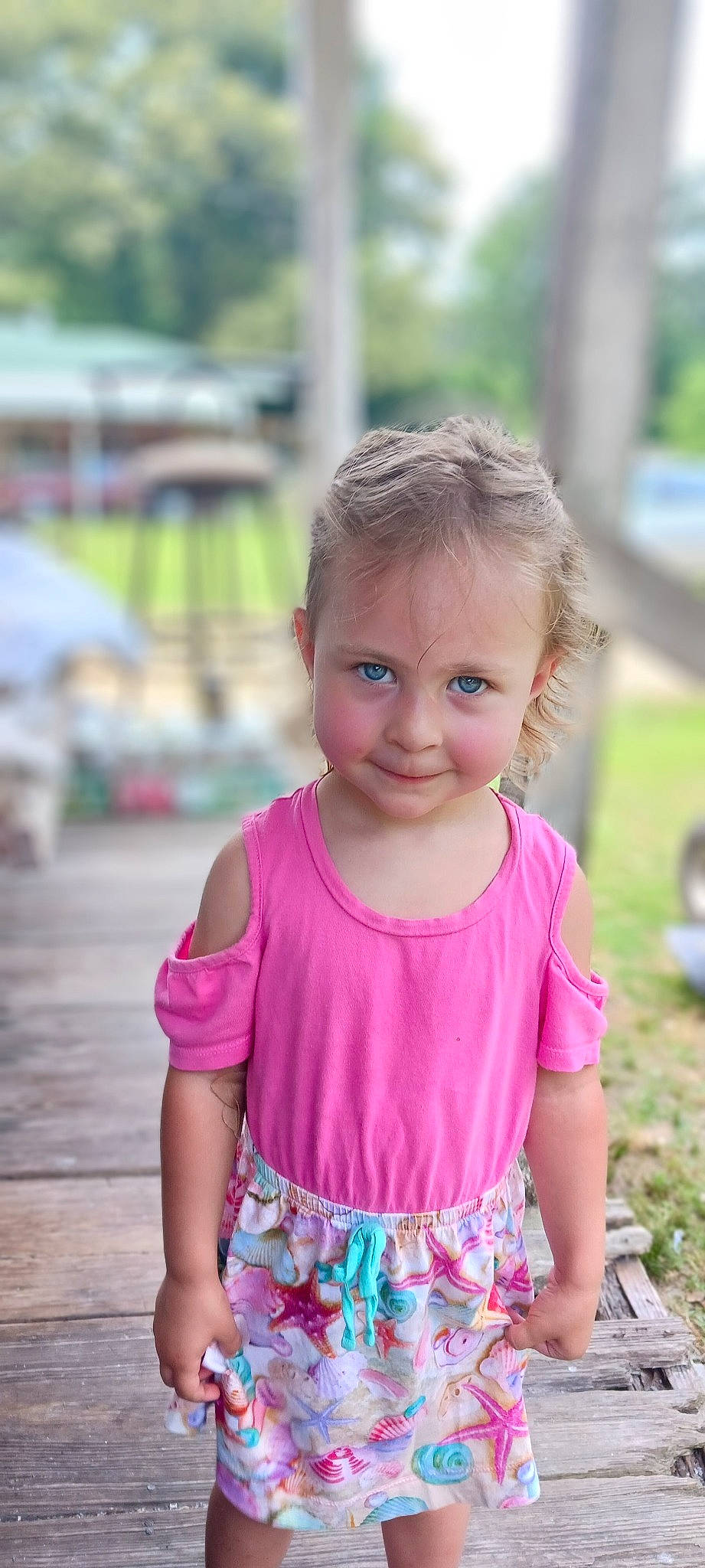 Raelah is registered to the contest to win money with this photo: baby, baby_toddler_clothing, child, fun, grass, hairstyle, happy, iris, joy, leisure, magenta, pattern, people_in_nature, person, pink, recreation, sleeve, smile, summer, t_shirt