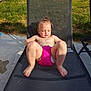 toddler, child, outdoor, sunlight, lawn_chair, pink_swim_diaper, grass, fence, summer, relaxing, barefoot, baby, mesh_chair, sunny_day, young_child, sitting, backyard, nature, casual, daytime