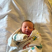 Kelly joined the competition — help win amazing prizes! newborn, baby, blanket, towel, sleeping, wrapped, infant, cute, peaceful, soft_light, indoors, portrait, child, face, cozy, small, fresh, resting, human, cute_baby