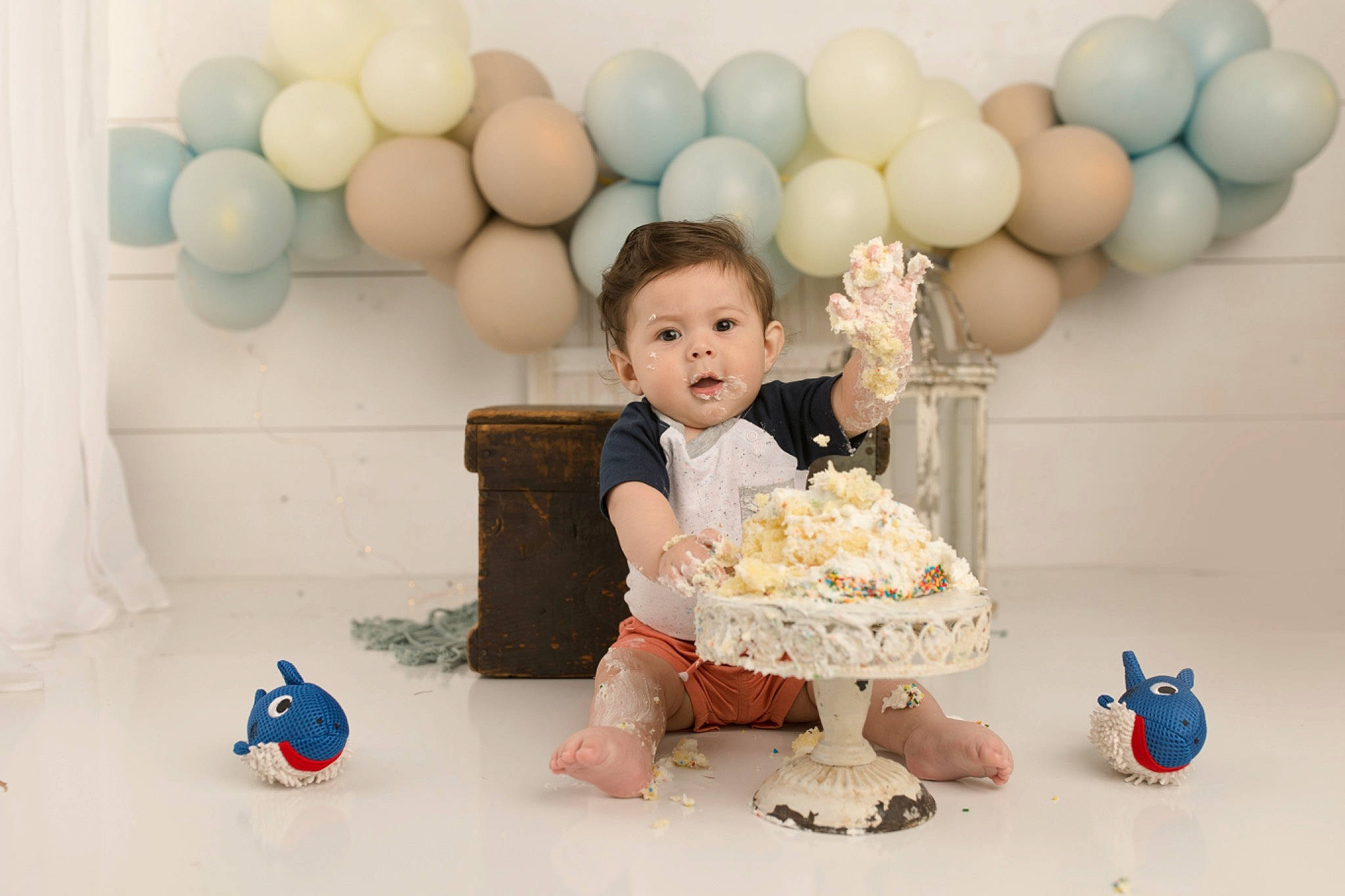 Aron joined the competition — help win amazing prizes! baby, baby_toddler_clothing, balloon, birthday, cake_decorating, chair, child, event, fun, happy, icing, party, party_supply, person, product, sugar_cake, sweetness, toddler, toy, white