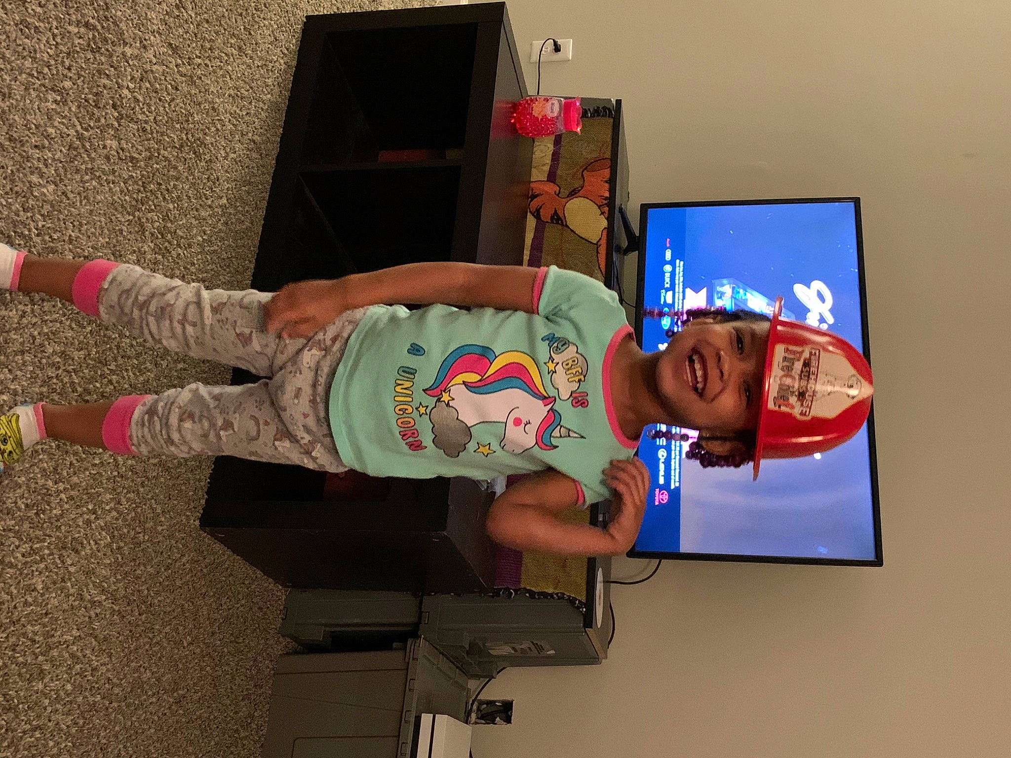Mary-ann is registered to the contest to win money with this photo: child, fun, headwear, joy, person, room