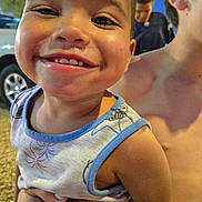 Hennessy joined the competition — help win amazing prizes! toddler, child, smile, happy, face, hand, shirtless, person, outdoor, evening, car, vehicle, tree, blue_sky, clothing, tank_top, closeup, portrait, cheeks, cute