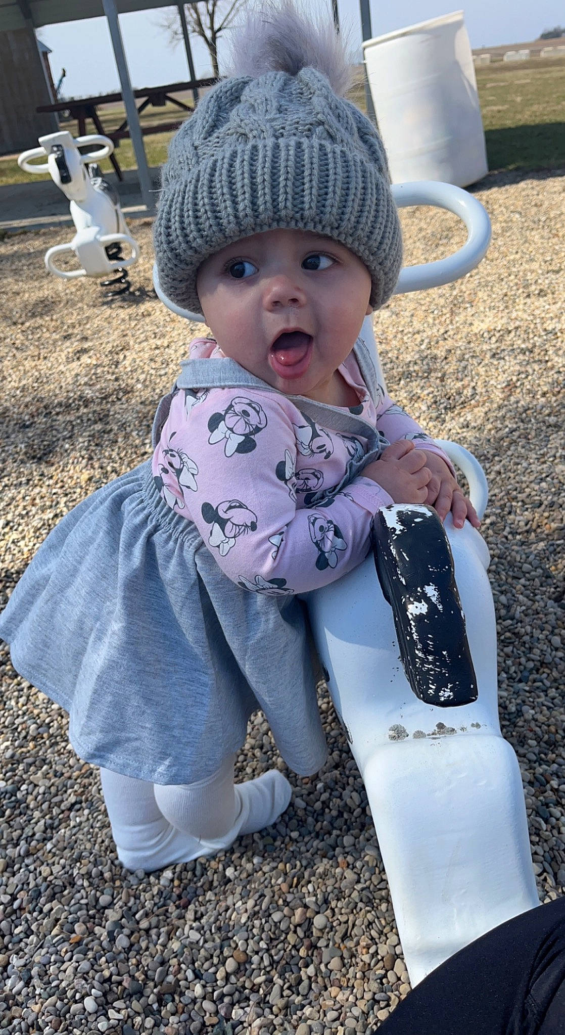 Amari is registered to the contest to win money with this photo: baby, baby_toddler_clothing, cap, child, cool, electric_blue, face, fashion_accessory, fun, grass, headwear, human_leg, light, pattern, person, photograph, public_space, recreation, sitting, snapshot