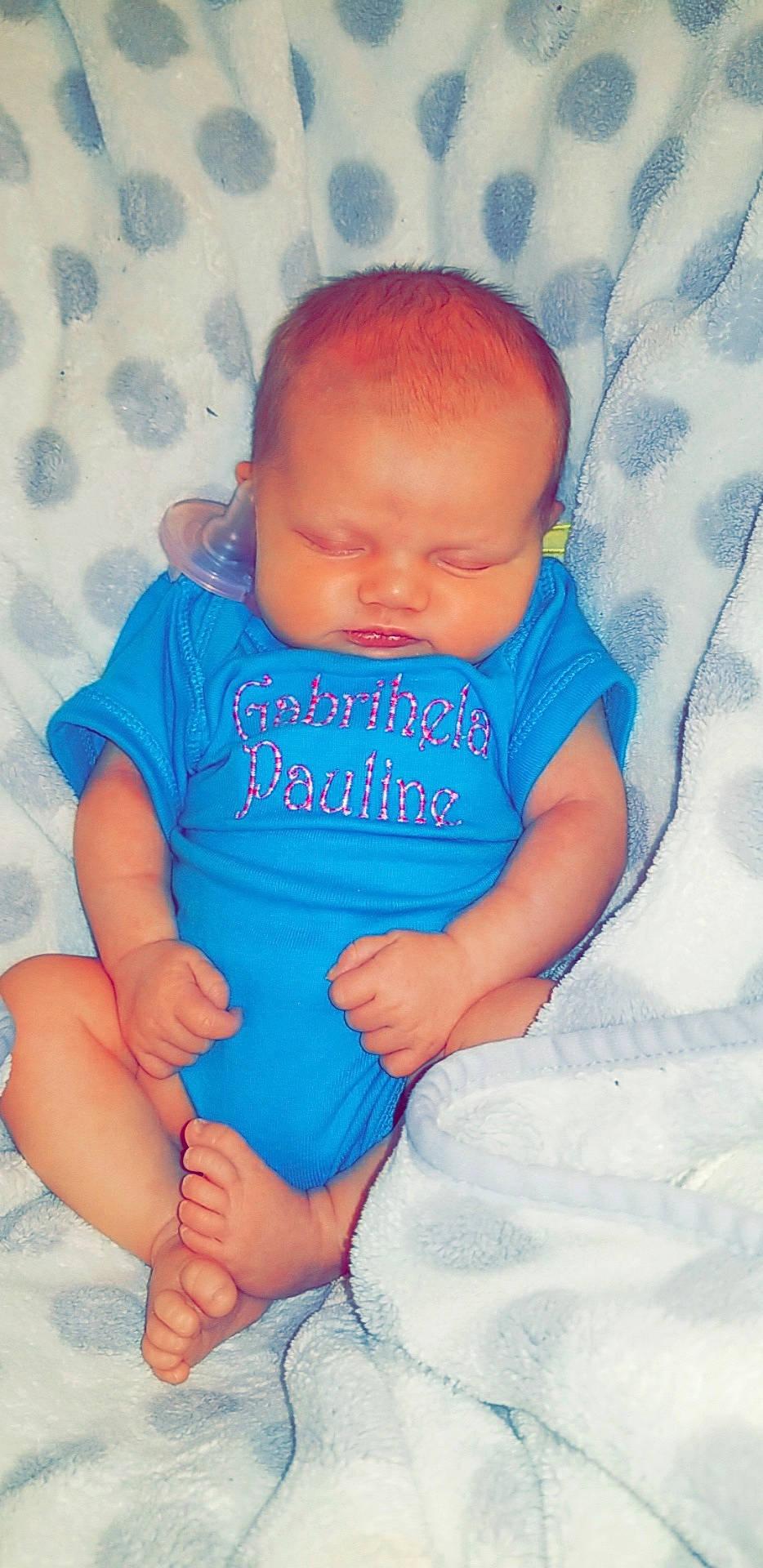 Gabrihela is registered to the contest to win money with this photo: baby, baby_products, baby_toddler_clothing, blue, cheek, child, nose, person, pink, product, skin, smile, toddler