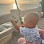 baby, bodypart, clothing, face, finger, fishing, hand, head, leisureactivities, nature, outdoors, person, photography, portrait, shorts, sky, summer, sun, water, waterfront