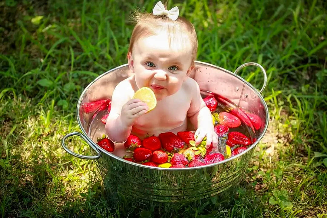 Ariah joined the competition — help win amazing prizes! baby, baby_products, baby_toddler_clothing, baby_toys, child, fruit, fun, grass, happy, natural_foods, people_in_nature, person, plant, play, recreation, rose_family, sitting, summer, sweetness, toddler