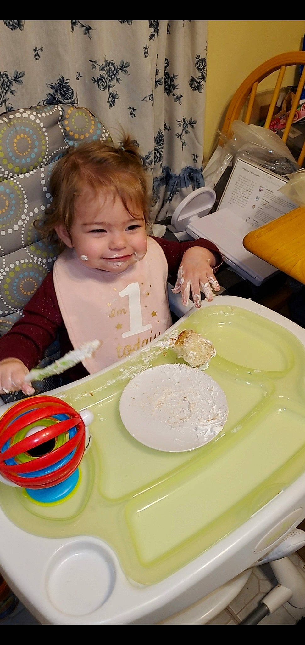 Isabella is registered to the contest to win money with this photo: baby, baking, birthday_cake, buttercream, cake_decorating, chair, child, dishware, event, food, fun, ingredient, joy, person, plate, serveware, smile, sugar_paste, sweetness, table