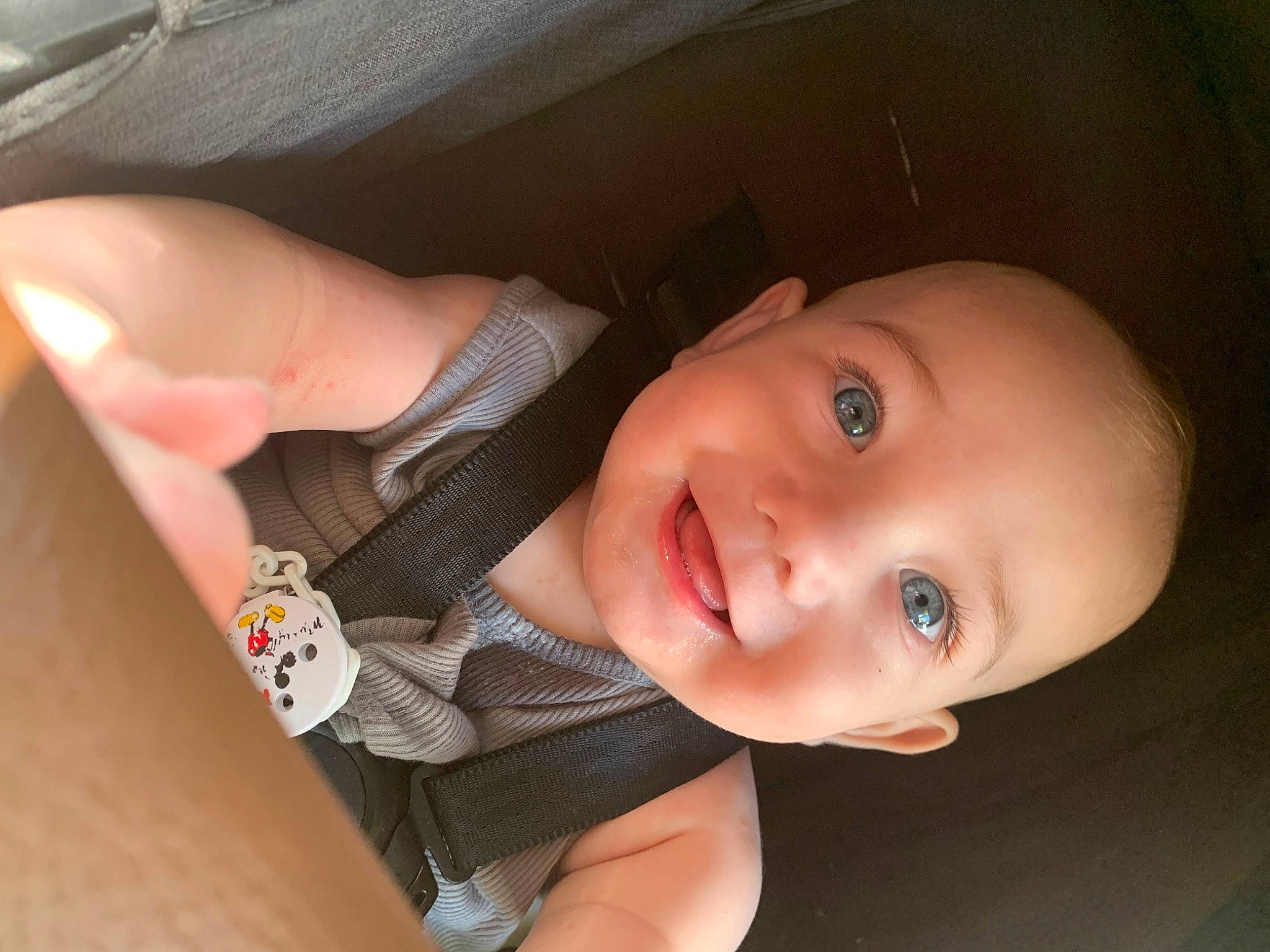Arlo is registered to the contest to win money with this photo: baby, baby_toddler_clothing, cheek, chest, elbow, eyelash, finger, flash_photography, gesture, hand, happy, iris, joy, lip, mouth, nose, person, skin, smile, thumb