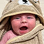 Raya joined the competition — help win amazing prizes! baby, towel, hood, bear, cute, smiling, happy, wrapped, skin, infant, expression, soft, child, face, mouth_open, eyes, portrait, indoors, warm, cozy