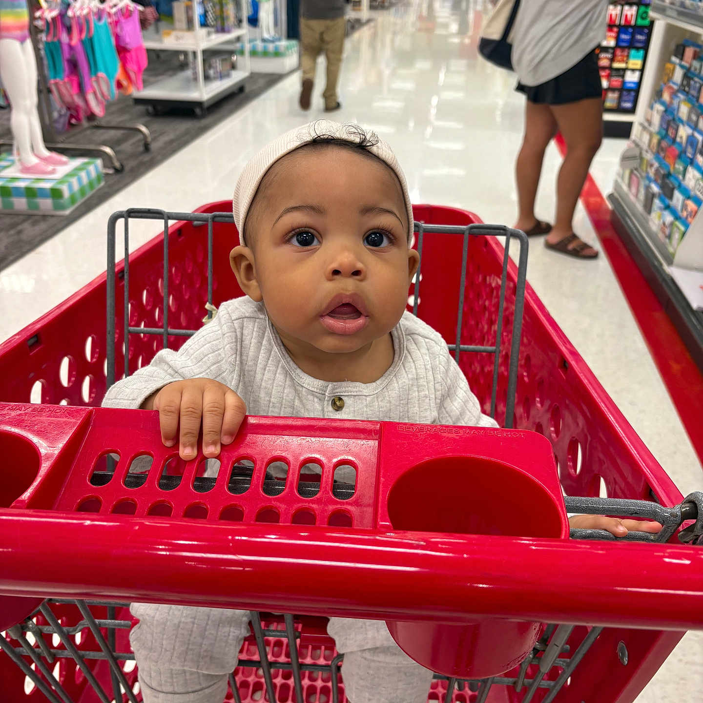 Nyuar joined the competition — help win amazing prizes! aisle, baby, baby_clothes, cart, child, clothing, curious, floor, footwear, grip, headwear, indoor, infant, people, person, retail, retail_store, shopping, shopping_cart, store