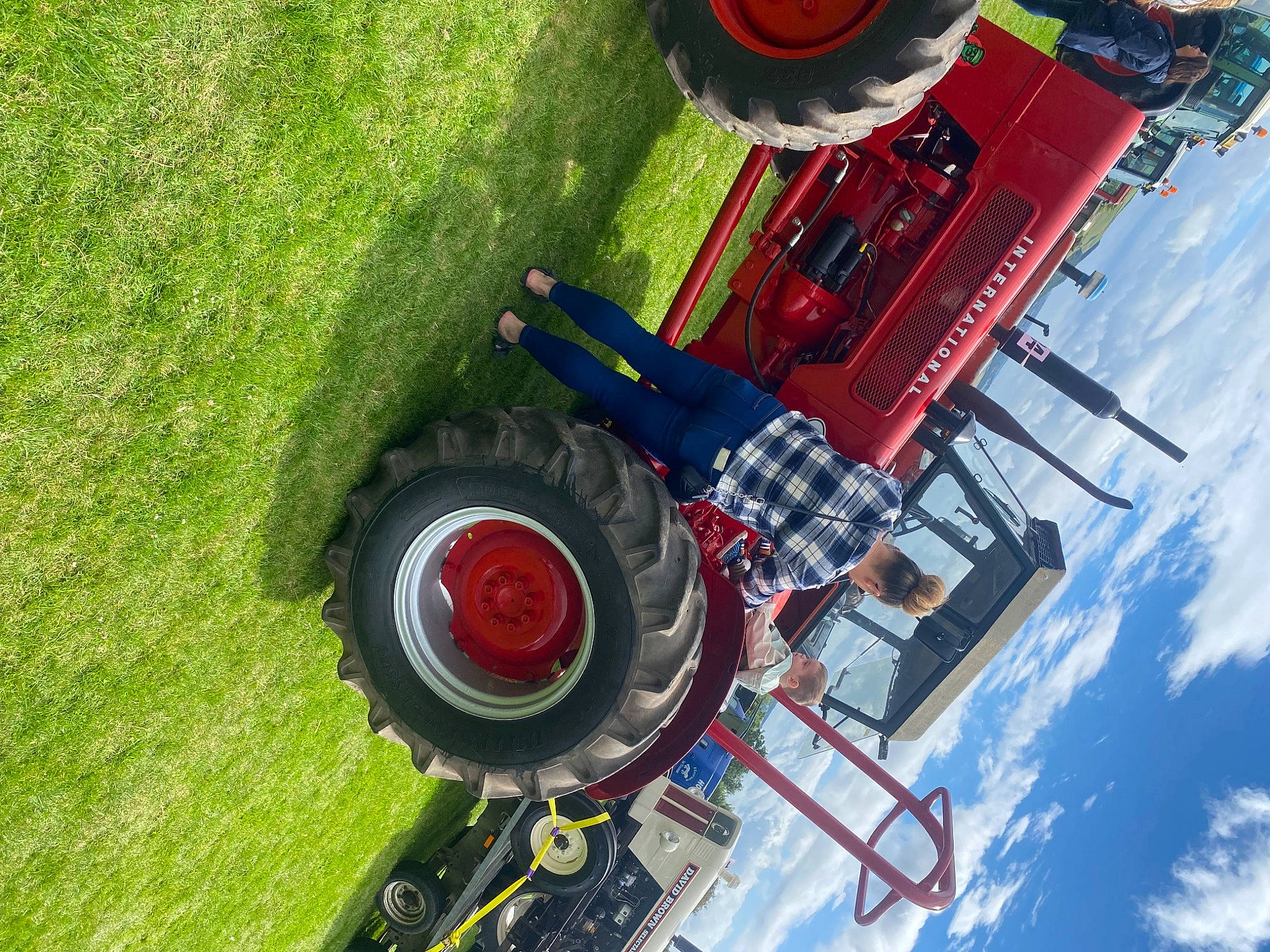 Eric is registered to the contest to win money with this photo: auto_part, automotive_exterior, automotive_tire, automotive_wheel_system, cloud, engineering, fender, fun, grass, green, machine, motor_vehicle, person, recreation, sky, soil, tire, tire_care, tread, vehicle