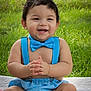 baby, child, smiling, blue_bow_tie, blue_suspenders, outdoor, grass, quilt, happy, clapping, cute, infant, sitting, summer, portrait, cheerful, fun, toddler, bare_chest, sunlight