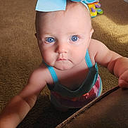 Brynlee joined the competition — help win amazing prizes! accessories, art, baby, bodypart, clothing, costume, couch, dress, face, finger, furniture, hand, hat, head, origami, paper, partyhat, person, photography, portrait