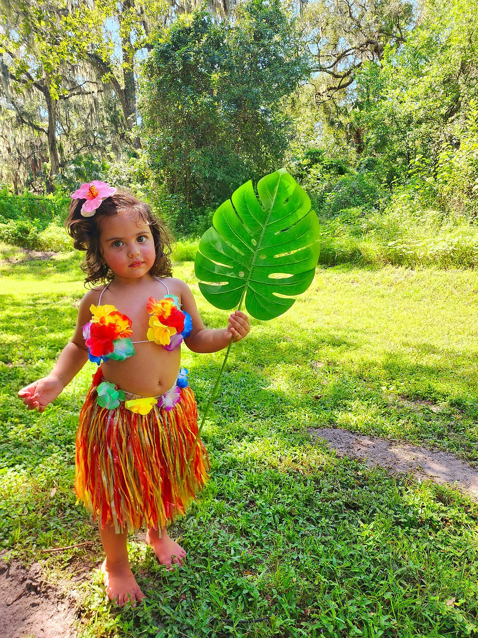 Laylani is registered to the contest to win money with this photo: flower, fruit, garden, grass, grassland, green, groundcover, happy, landscape, leisure, magenta, meadow, people_in_nature, person, plant, plantation, shrub, terrestrial_plant, toddler, tree