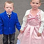 child, children, boy, girl, holding_hands, formal_clothing, blue_blazer, pink_dress, bow, outdoor, pavement, grass, footwear, casual_shoes, smiling, portrait, cute, young, fashion, event