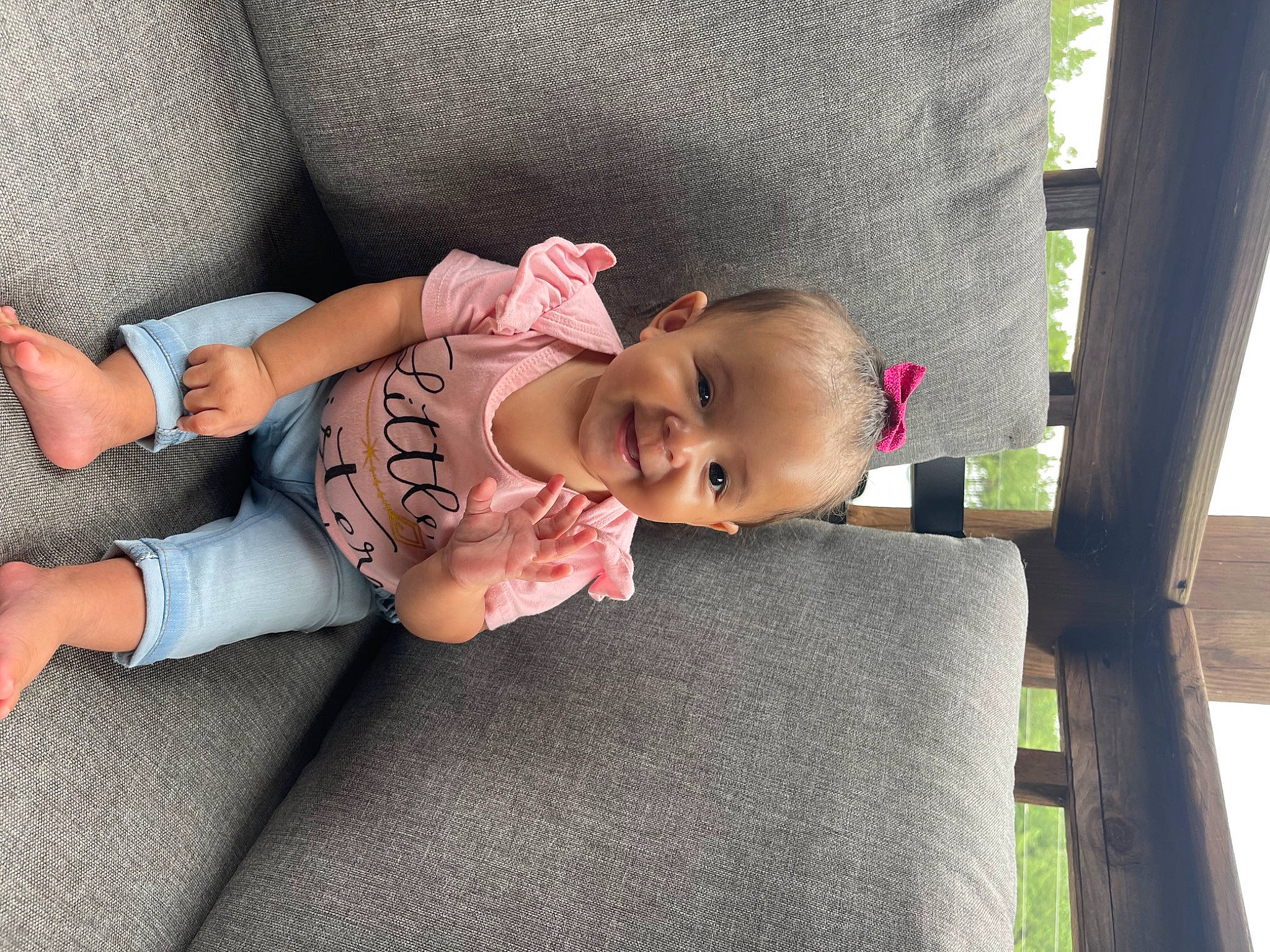 Calliope joined the competition — help win amazing prizes! baby, baby_carriage, baby_products, baby_toddler_clothing, child, comfort, eye, foot, grass, human_body, joy, lap, leg, person, plant, product, sitting, skin, sock, toddler