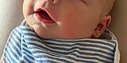 Brayden joined the competition — help win amazing prizes! baby, sleeping, bib, striped, closeup, face, infant, person, skin, peaceful, relaxing, nap, comfort, human, cute, soft, young, child, resting, portrait
