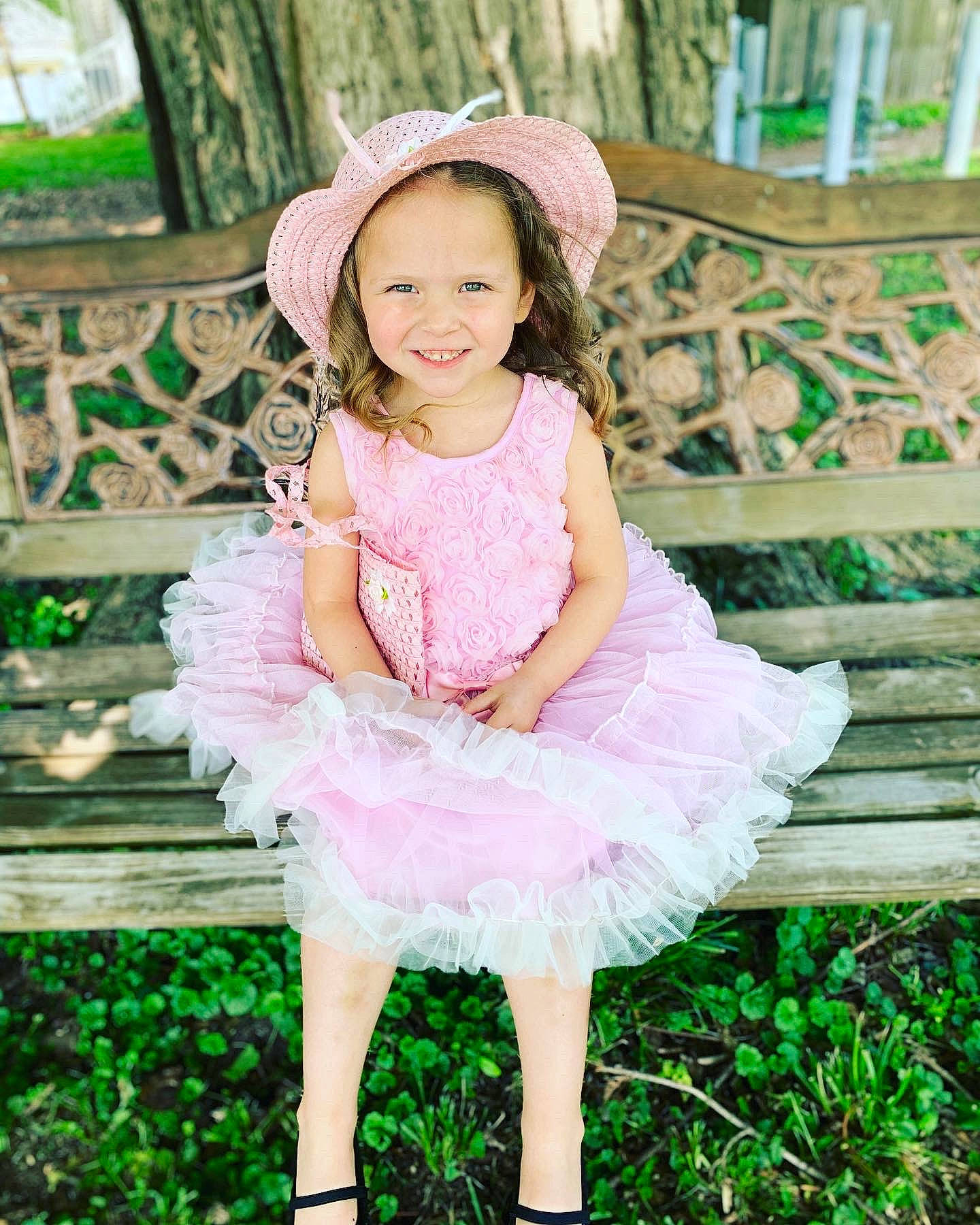 Aubriella is registered to the contest to win money with this photo: baby_toddler_clothing, botany, clothing, day_dress, dress, eye, flash_photography, grass, green, happy, hat, iris, joy, person, pink, plant, purple, shoulder, skin, sleeve