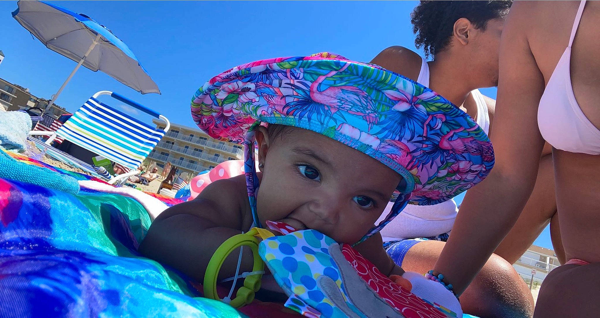 Dalylah Lahrey is registered to the contest to win money with this photo: azure, beauty, cap, electric_blue, event, fun, happy, hat, headgear, headwear, leisure, magenta, person, photograph, recreation, sky, summer, sun_hat, sun_tanning, swimwear