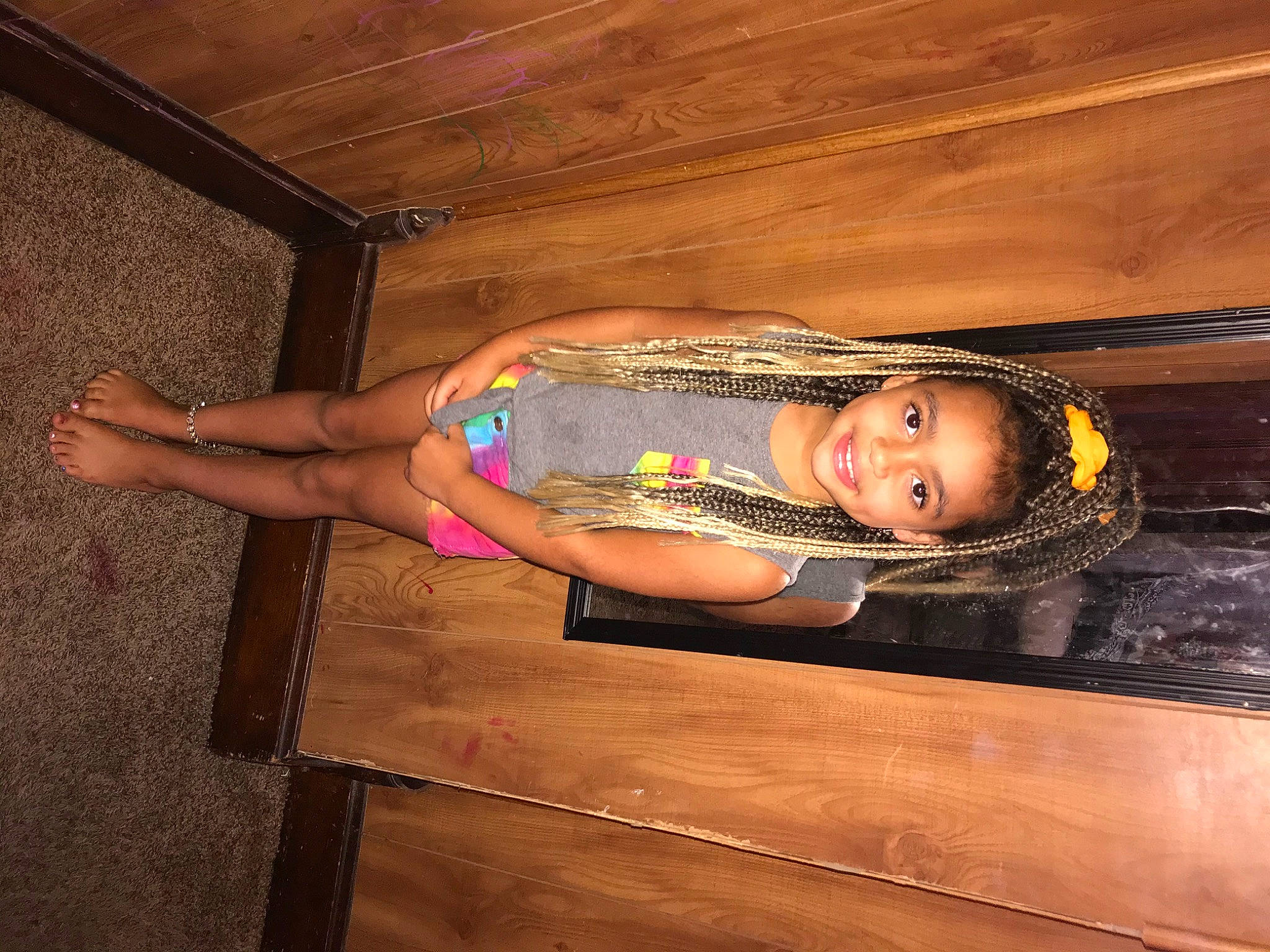 Malaya is registered to the contest to win money with this photo: elbow, flash_photography, flooring, foot, fun, happy, hardwood, human_leg, joy, leg, leisure, magenta, person, room, sandal, smile, thigh, toddler, trunk, wood