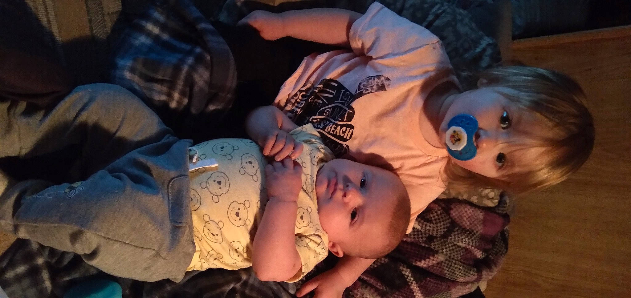 Sebastian is registered to the contest to win money with this photo: baby, cheek, child, eyelash, flash_photography, flesh, fun, grass, happy, hat, headgear, human, human_body, mouth, pattern, person, plant, room, toddler, toy