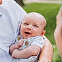 baby, smiling, adult, holding, outdoor, grass, happy, portrait, closeup, cute, infant, family, love, people, skin, clothing, watching, arm, button, watch