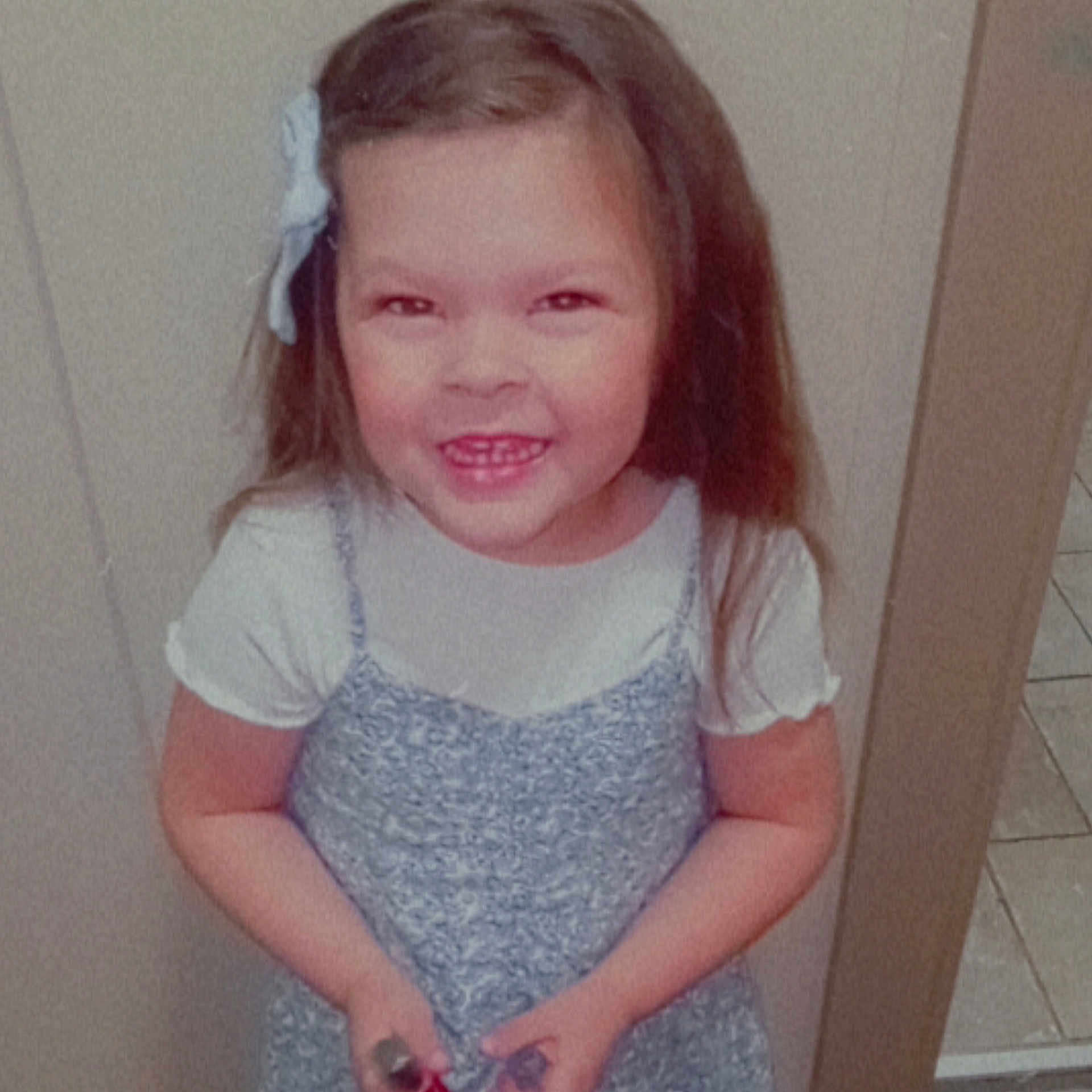 Gracelynn is registered to the contest to win money with this photo: accessories, bodypart, child, clothing, door, dress, face, female, girl, happy, head, indoors, laughing, mouth, person, photography, portrait, smile, t_shirt, teeth