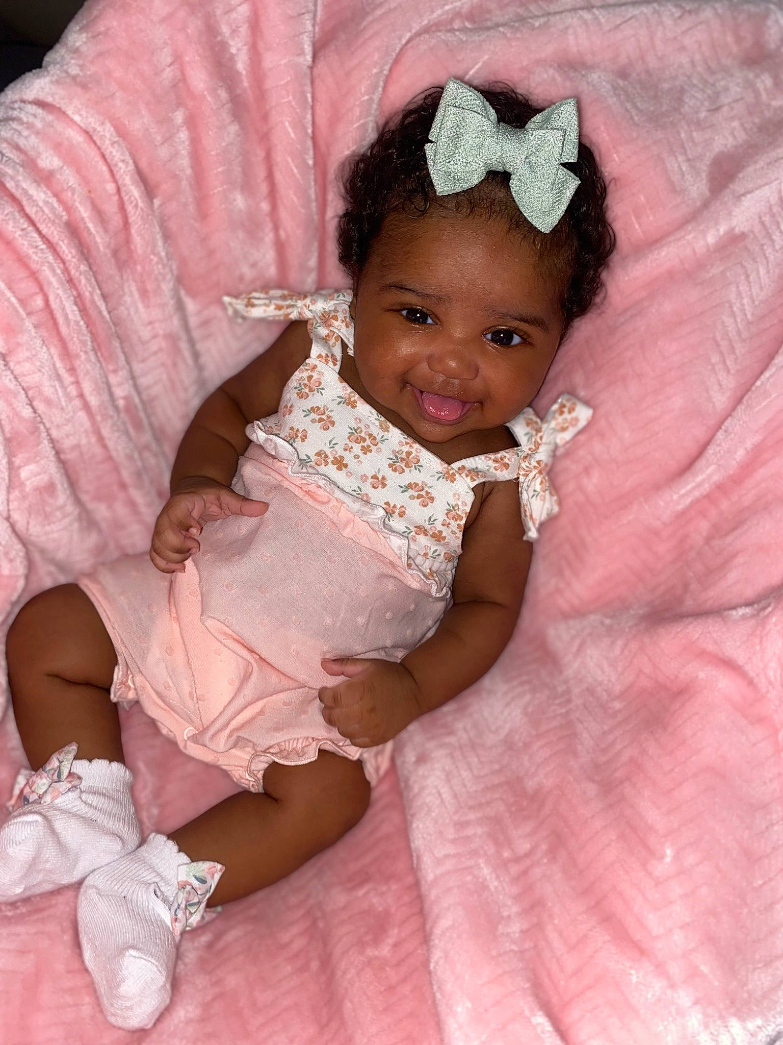 Malani is registered to the contest to win money with this photo: baby, baby_toddler_clothing, bridal_accessory, costume_hat, dress, embellishment, eyelash, fashion_accessory, hair_accessory, happy, headband, headpiece, jewellery, joy, magenta, peach, person, pink, ruffle, sleeve