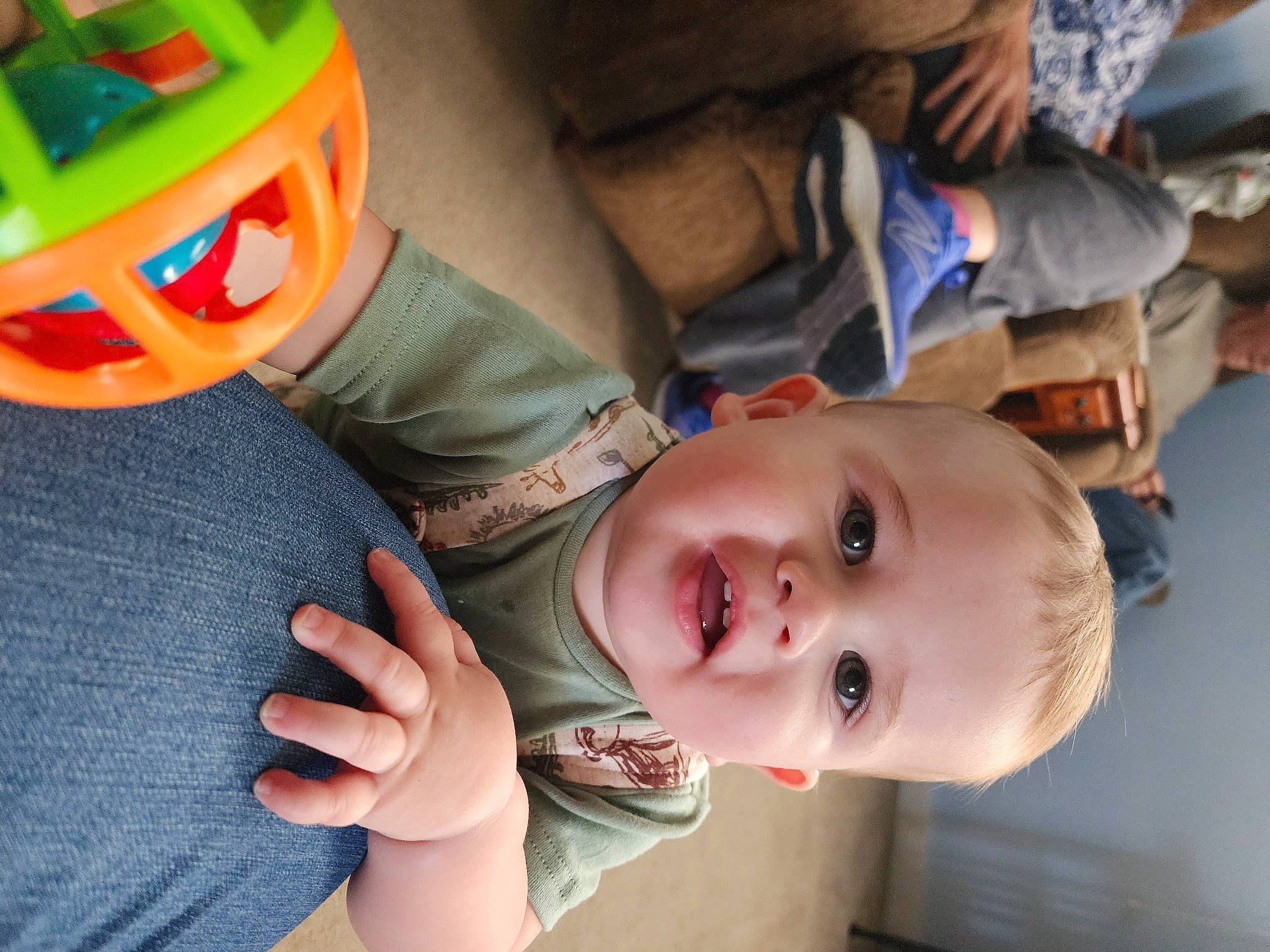 Kross is registered to the contest to win money with this photo: baby, baby_products, baby_toddler_clothing, cheek, child, finger, fun, hand, happy, headgear, mouth, nose, organ, person, personal_protective_equipment, skin, smile, thumb, toddler, toy