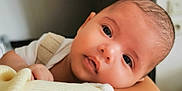Numa participe au concours pour gagner de l'argent avec cette photo : baby, infant, face, head, eyes, skin, hand, blanket, soft, portrait, closeup, resting, curious, indoors, person, newborn, expression, cute, child, young