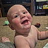 Jayce joined the competition — help win amazing prizes! baby, child, smiling, happy, indoor, living_room, carpet, toy, television, animation, furniture, person, couch, foot, skin, head, cheeks, arm, playful, home
