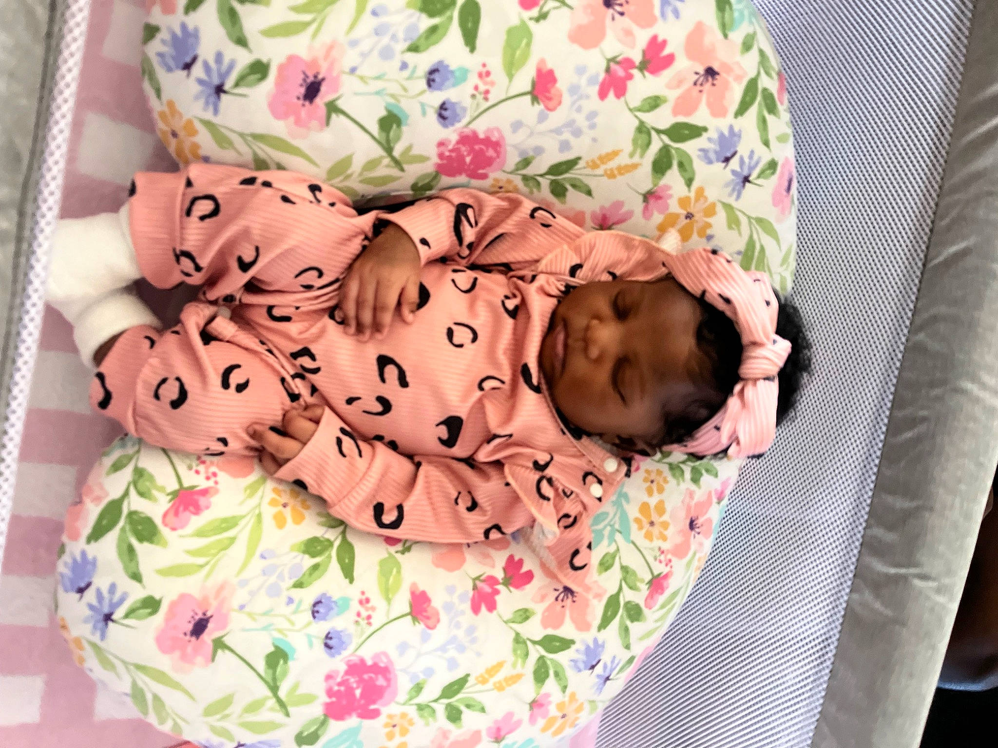Ivy is registered to the contest to win money with this photo: baby, baby_products, baby_safety, baby_sleeping, baby_toddler_clothing, bed, bedding, bedtime, child, comfort, infant_bed, linens, nap, pattern, person, pink, product, room, sleeve, textile