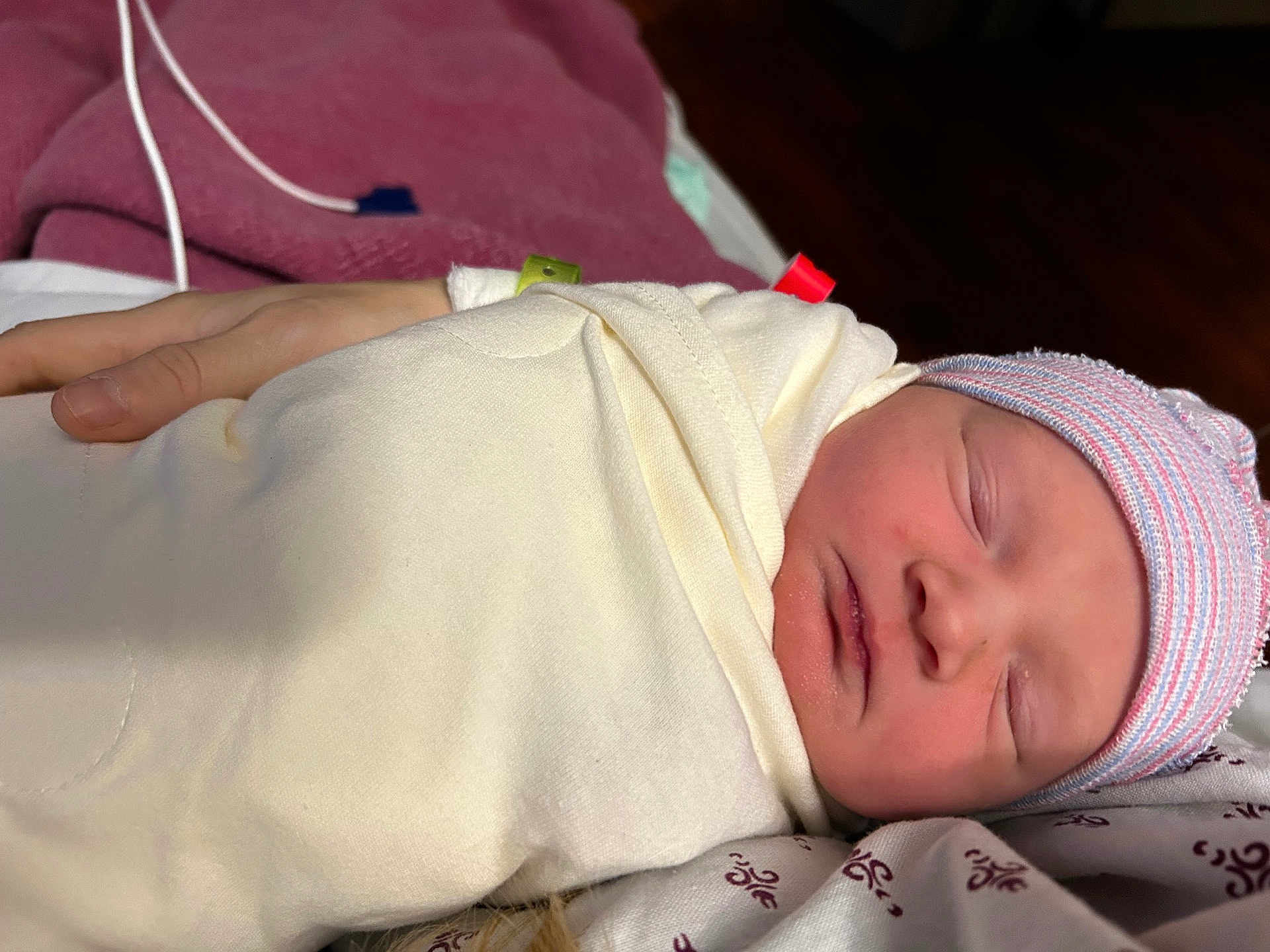Gracelynn Ann Marie joined the competition — help win amazing prizes! newborn, baby, swaddled, blanket, hat, sleeping, hand, hospital, infant, resting, peaceful, soft, closeup, person, wrapped, child, cute, skin, portrait, indoors
