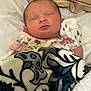 Gracelynn Ann Marie is registered to the contest to win money with this photo: baby, sleeping, blanket, mitten, newborn, bed, cozy, infant, face, peaceful, comfort, cute, animal_print, soft, pillow, child, portrait, resting, indoors, clothing