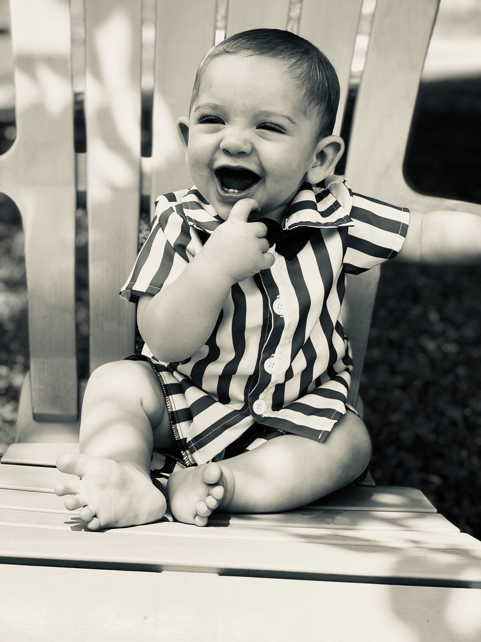 Maverick is registered to the contest to win money with this photo: baby, baby_toddler_clothing, black, black_and_white, child, elbow, facial_expression, flash_photography, fun, gesture, happy, monochrome, monochrome_photography, person, sitting, smile, standing, stock_photography, style, toddler