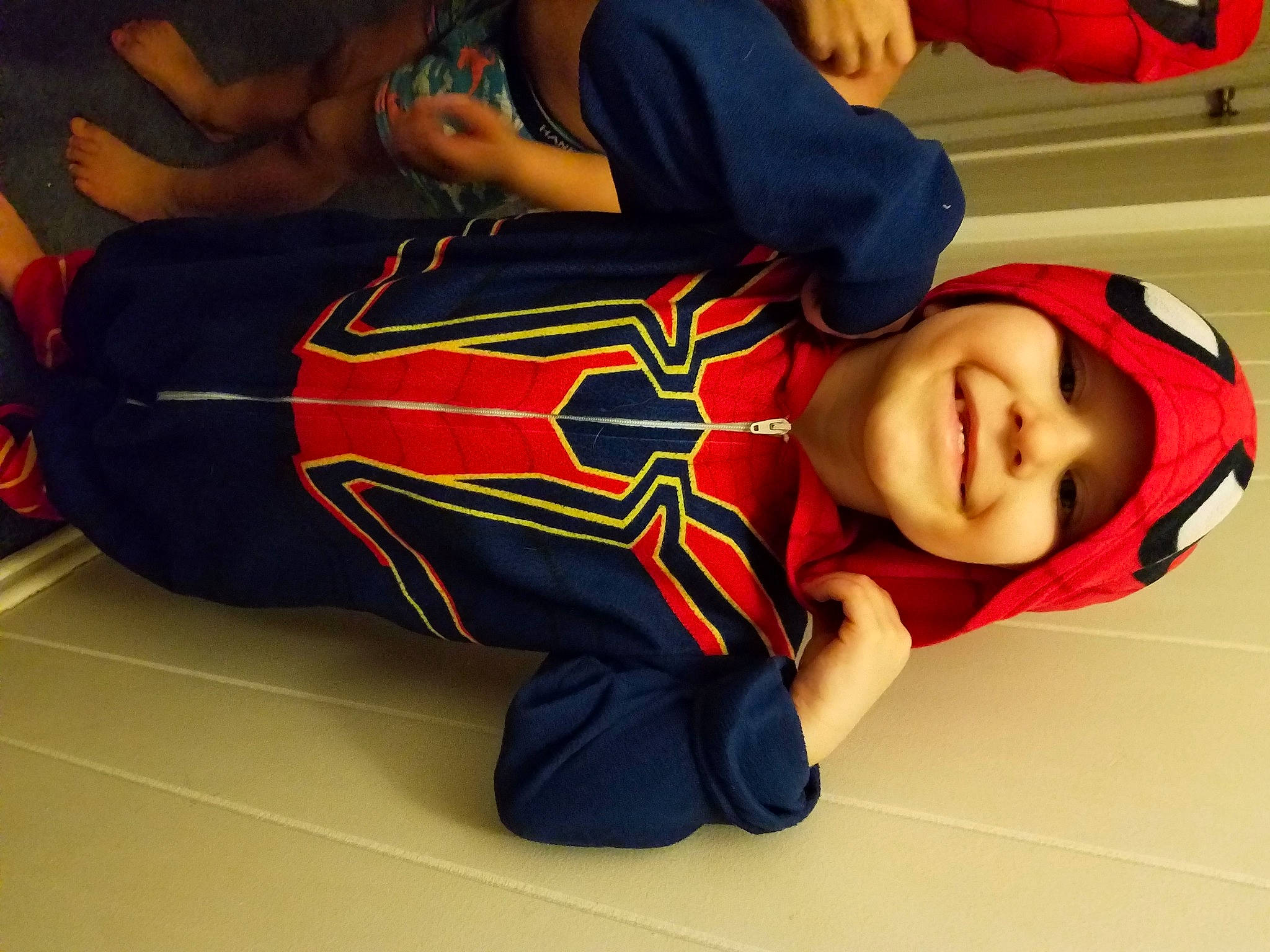 Derrick joined the competition — help win amazing prizes! animation, carmine, child, costume, elbow, electric_blue, fictional_character, flooring, fun, headgear, headwear, human_leg, joy, knee, leisure, person, sitting, sleeve, sportswear, thigh