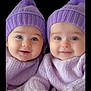 baby, twin_babies, purple_hat, purple_sweater, smiling, cute, infant, knitwear, portrait, closeup, child, face, blue_eyes, soft_lighting, warm_clothing, adorable, happy, indoor, two_children, black_background