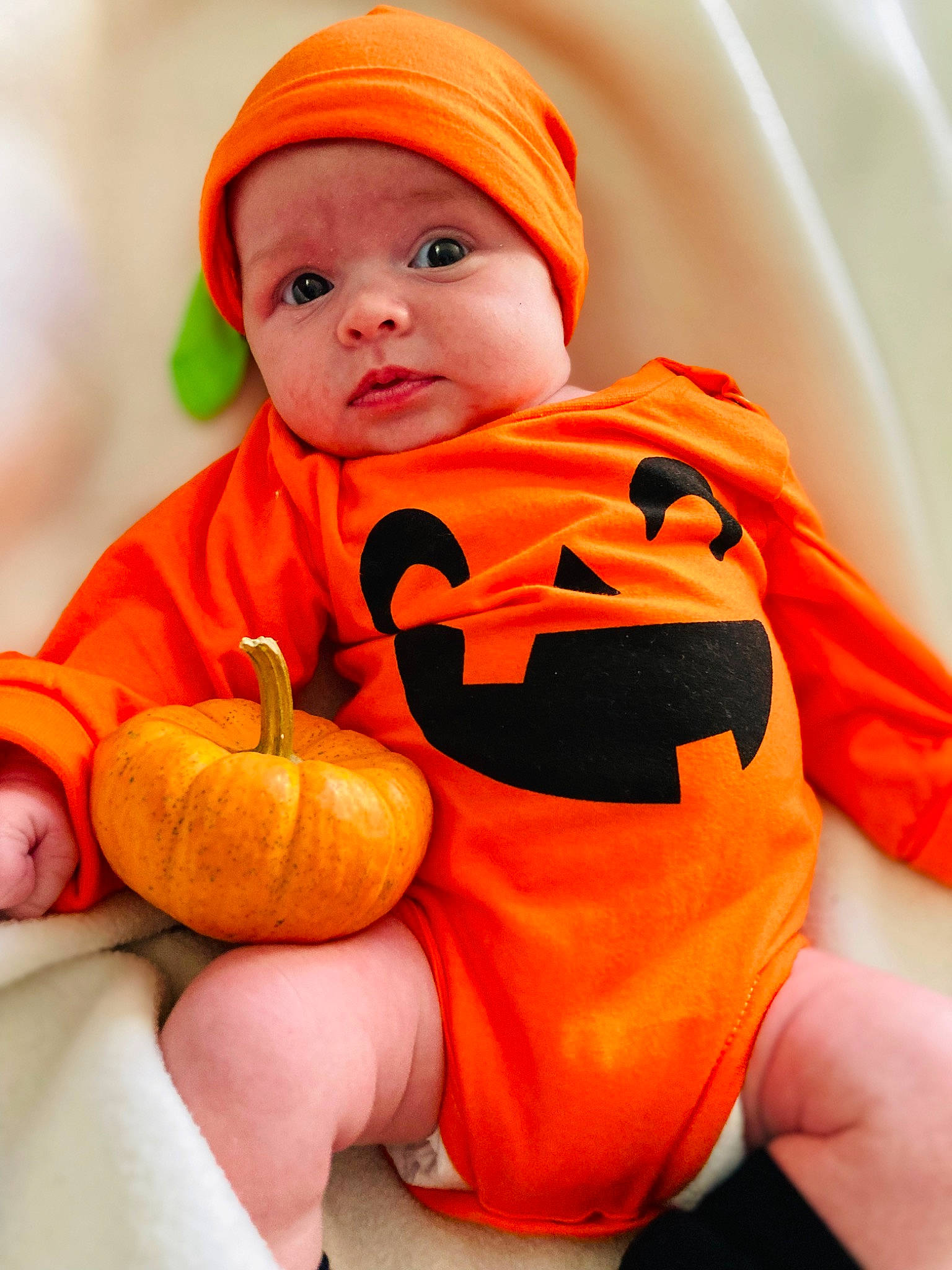 Abby joined the competition — help win amazing prizes! baby, baby_toddler_clothing, calabaza, child, comfort, cucurbita, eye, facial_expression, gourd, happy, headwear, human_body, natural_foods, orange, outerwear, person, pumpkin, sleeve, squash, toddler