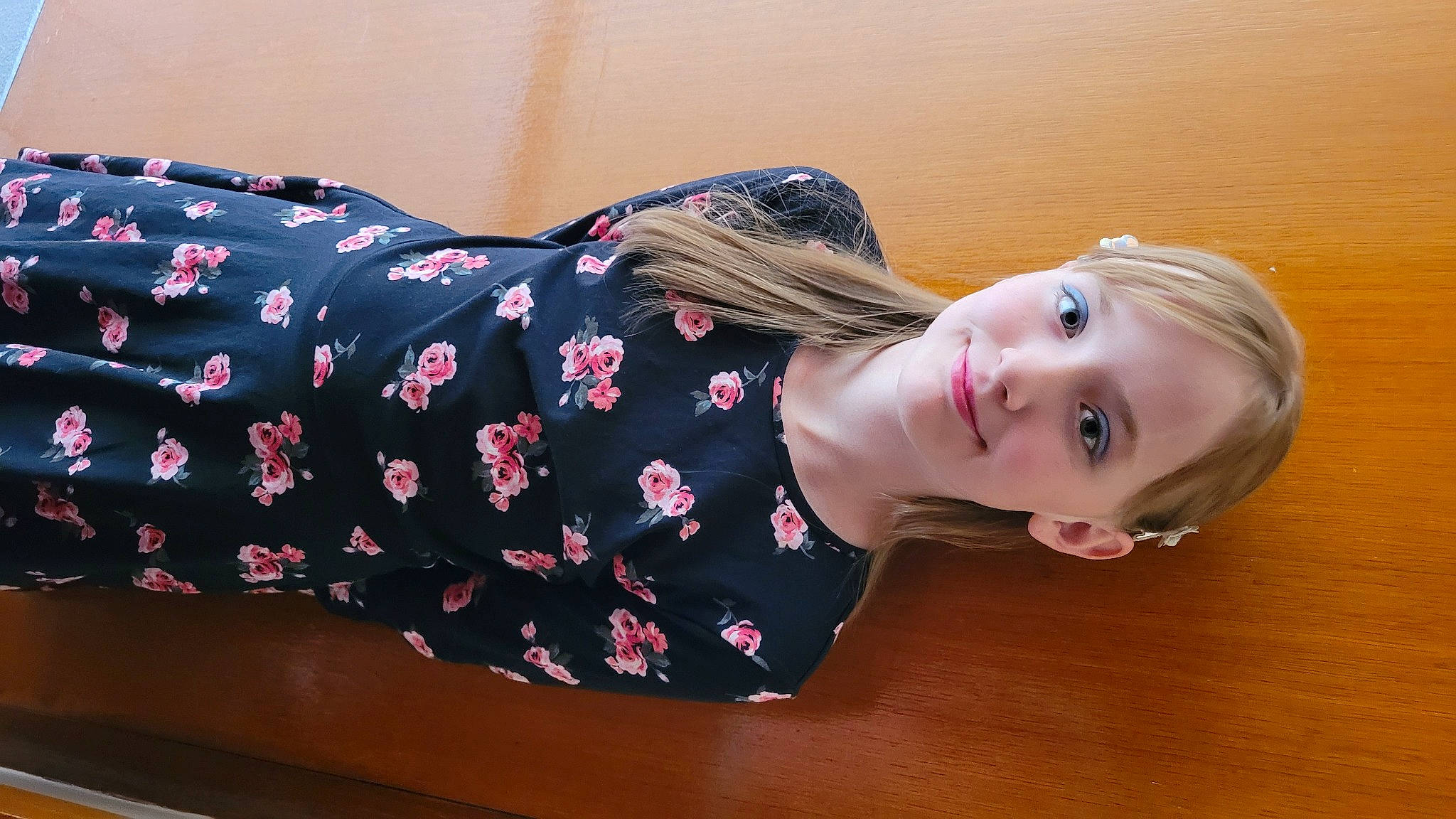 Marissa participe au concours pour gagner de l'argent avec cette photo : baby_toddler_clothing, child, elbow, floor, flooring, happy, hardwood, human_leg, joy, knee, long_hair, magenta, neck, pattern, person, pink, sitting, sleeve, thigh, toddler