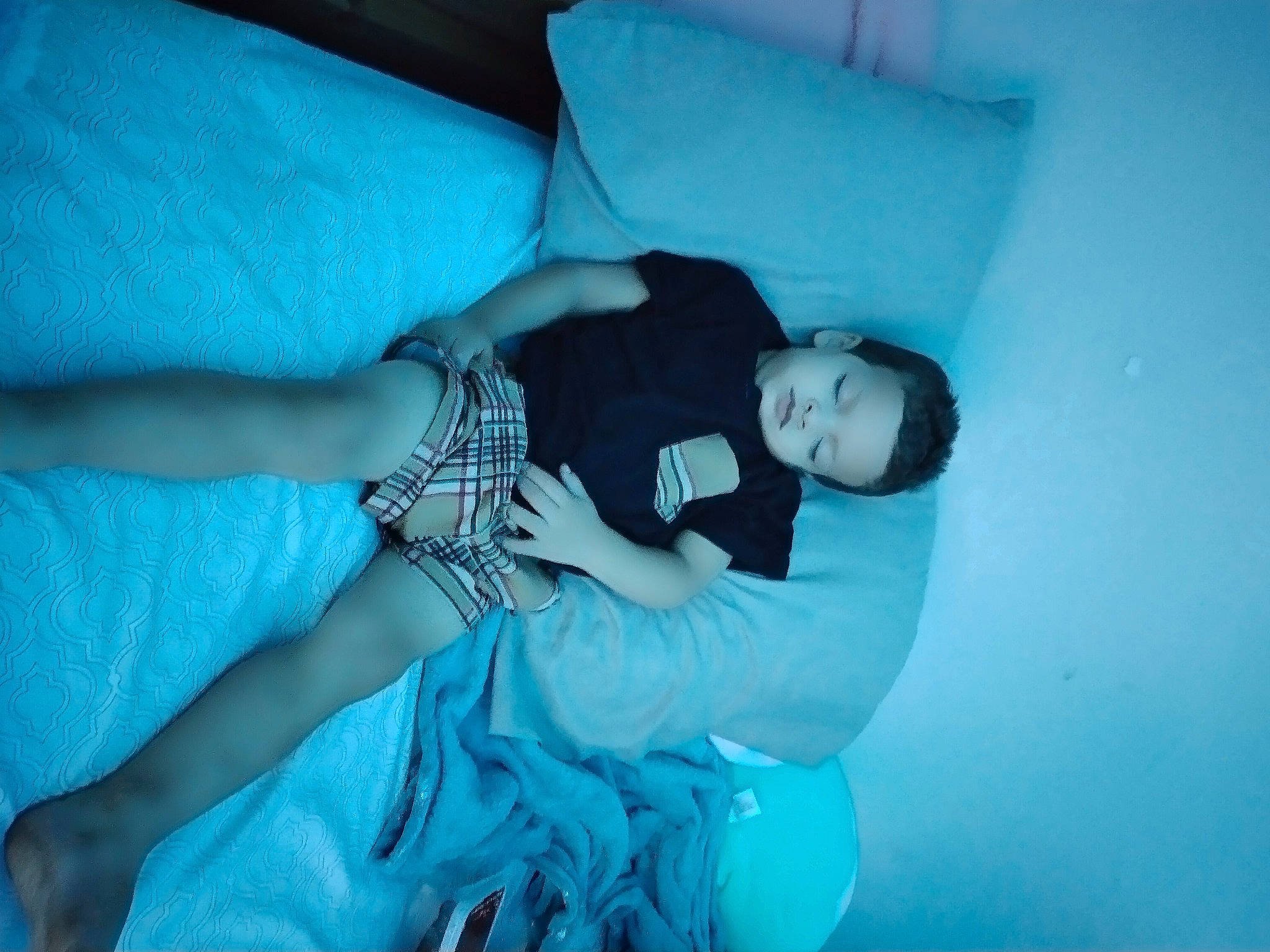 Kolten is registered to the contest to win money with this photo: aqua, arm, azure, black_hair, blue, comfort, elbow, electric_blue, eye, flash_photography, hair, hand, happy, head, human_body, human_leg, knee, leg, person, textile