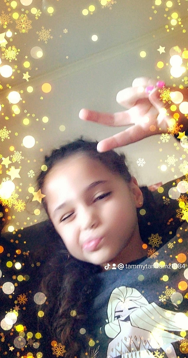 Anayah is registered to the contest to win money with this photo: beauty, branch, christmas, christmas_decoration, christmas_ornament, event, facial_expression, flash_photography, fun, gesture, happy, holiday, leaf, ornament, pattern, people_in_nature, person, photograph, plant, snapshot