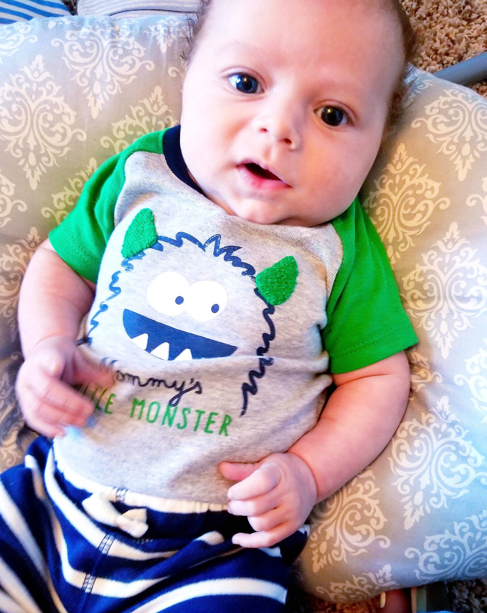 Ethan is registered to the contest to win money with this photo: baby, baby_products, baby_toddler_clothing, blue, child, cool, person, product, sleeve, smile, t_shirt, toddler