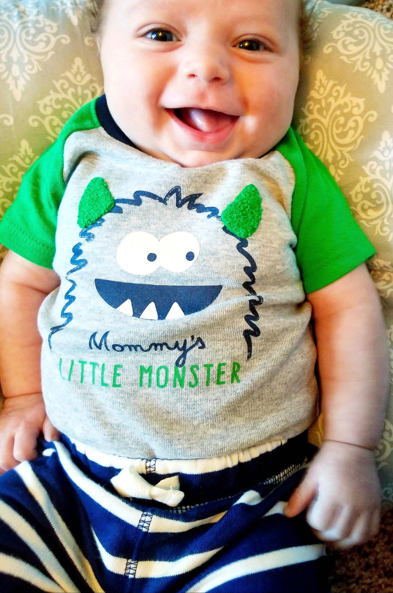 Ethan joined the competition — help win amazing prizes! baby, baby_products, baby_toddler_clothing, cheek, child, cool, green, happy, headwear, outerwear, person, product, sleeve, smile, t_shirt, toddler