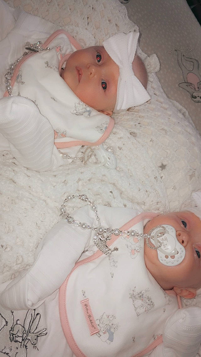 Ezmae is registered to the contest to win money with this photo: abdomen, baby, baby_products, baby_sleeping, baby_toddler_clothing, chest, child, comfort, finger, headwear, linens, lip, peach, person, pink, skin, stomach, textile, thigh, toddler