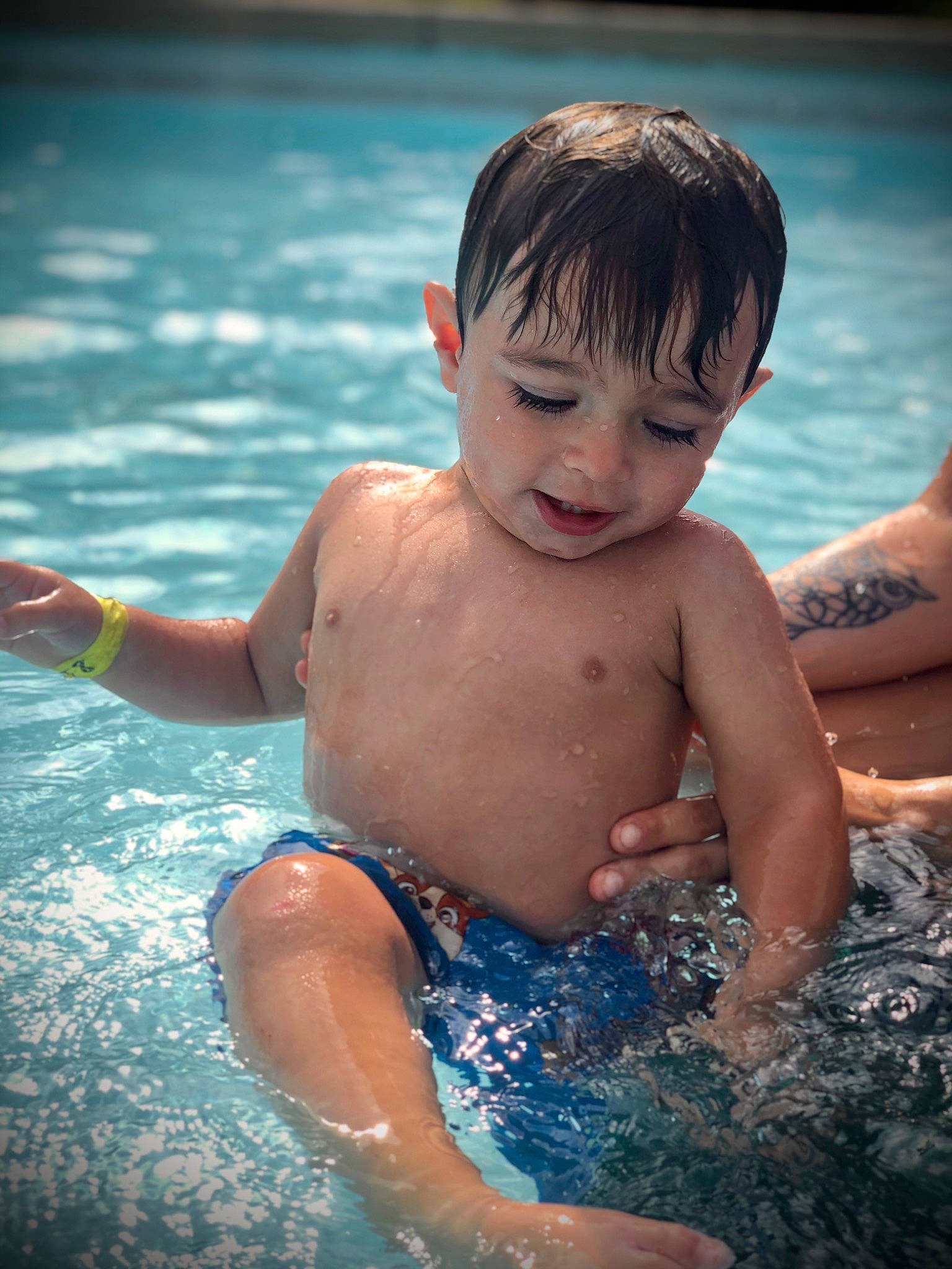 Quinten is registered to the contest to win money with this photo: barechested, bathing, chest, child, fun, happy, leisure, muscle, person, photography, play, recreation, skin, smile, summer, swimming_pool, swimwear, toddler, trunk, vacation