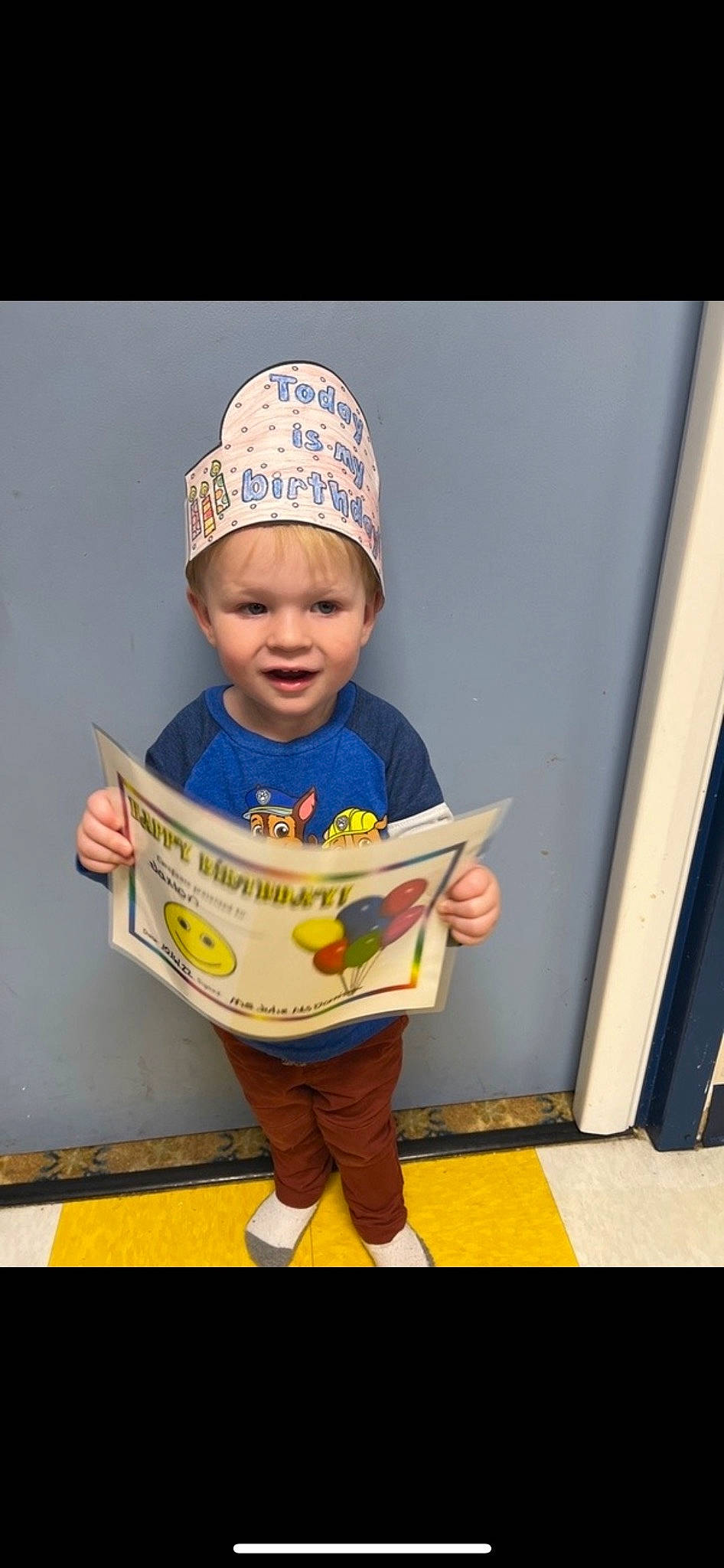 Jaxton joined the competition — help win amazing prizes! baby, baseball_cap, cap, child, clothing, costume_hat, electric_blue, facial_expression, fashion_accessory, flooring, fun, happy, headgear, person, play, sleeve, smile, standing, t_shirt, toddler