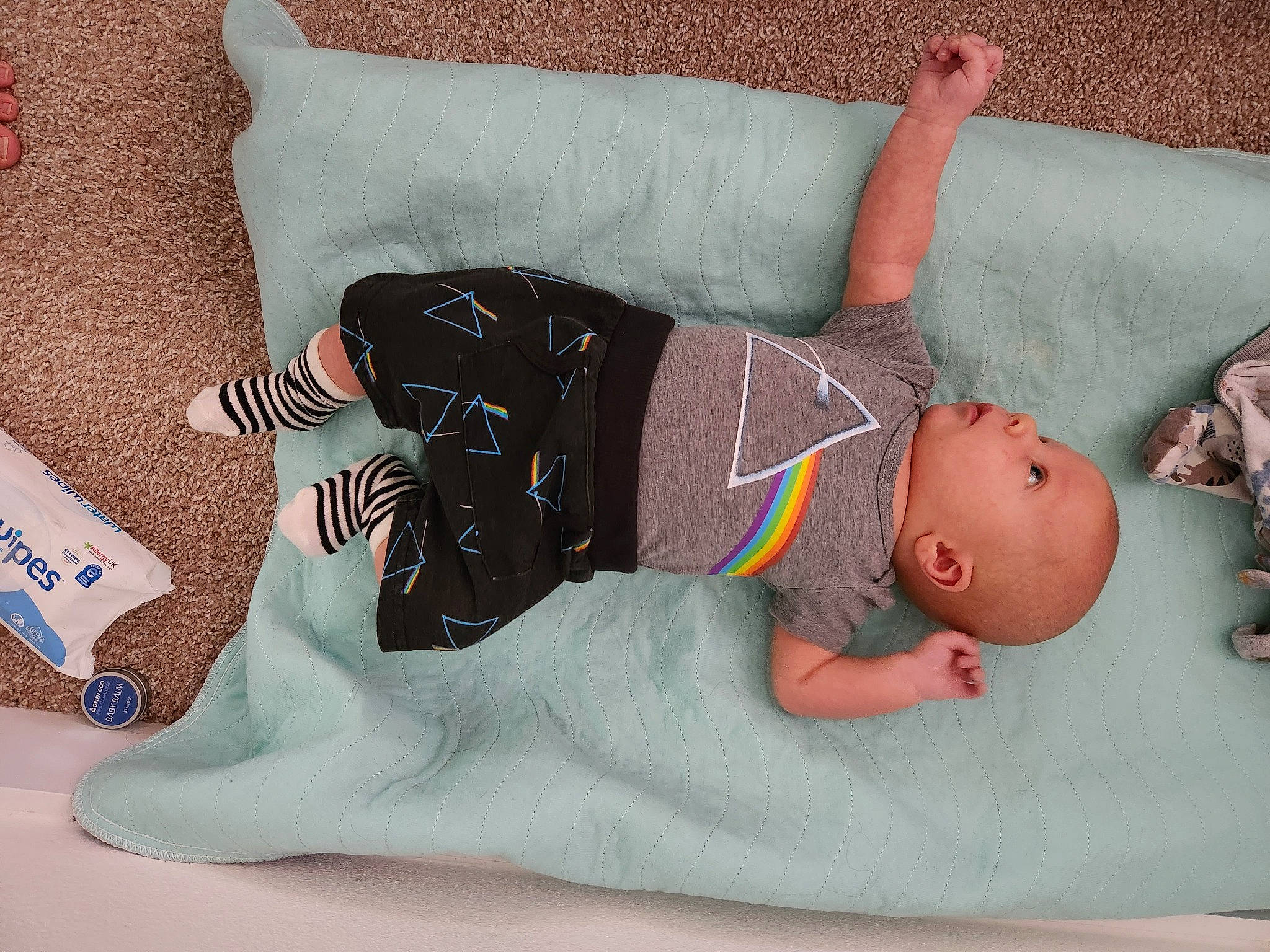Zayden is registered to the contest to win money with this photo: abdomen, arm, baby, baby_toddler_clothing, bed, chest, comfort, elbow, finger, head, human_body, joint, knee, linens, person, stomach, textile, thigh, toddler, trunk