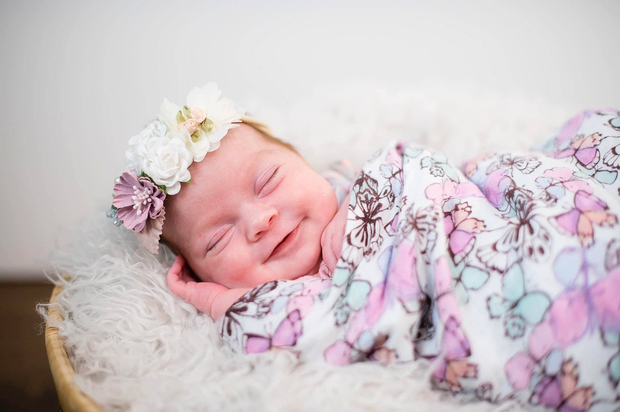 Joanna joined the competition — help win amazing prizes! baby, baby_toddler_clothing, cheek, child, comfort, embellishment, eyebrow, eyelash, flash_photography, grass, happy, headband, headpiece, headwear, jewellery, linens, pattern, person, petal, pink